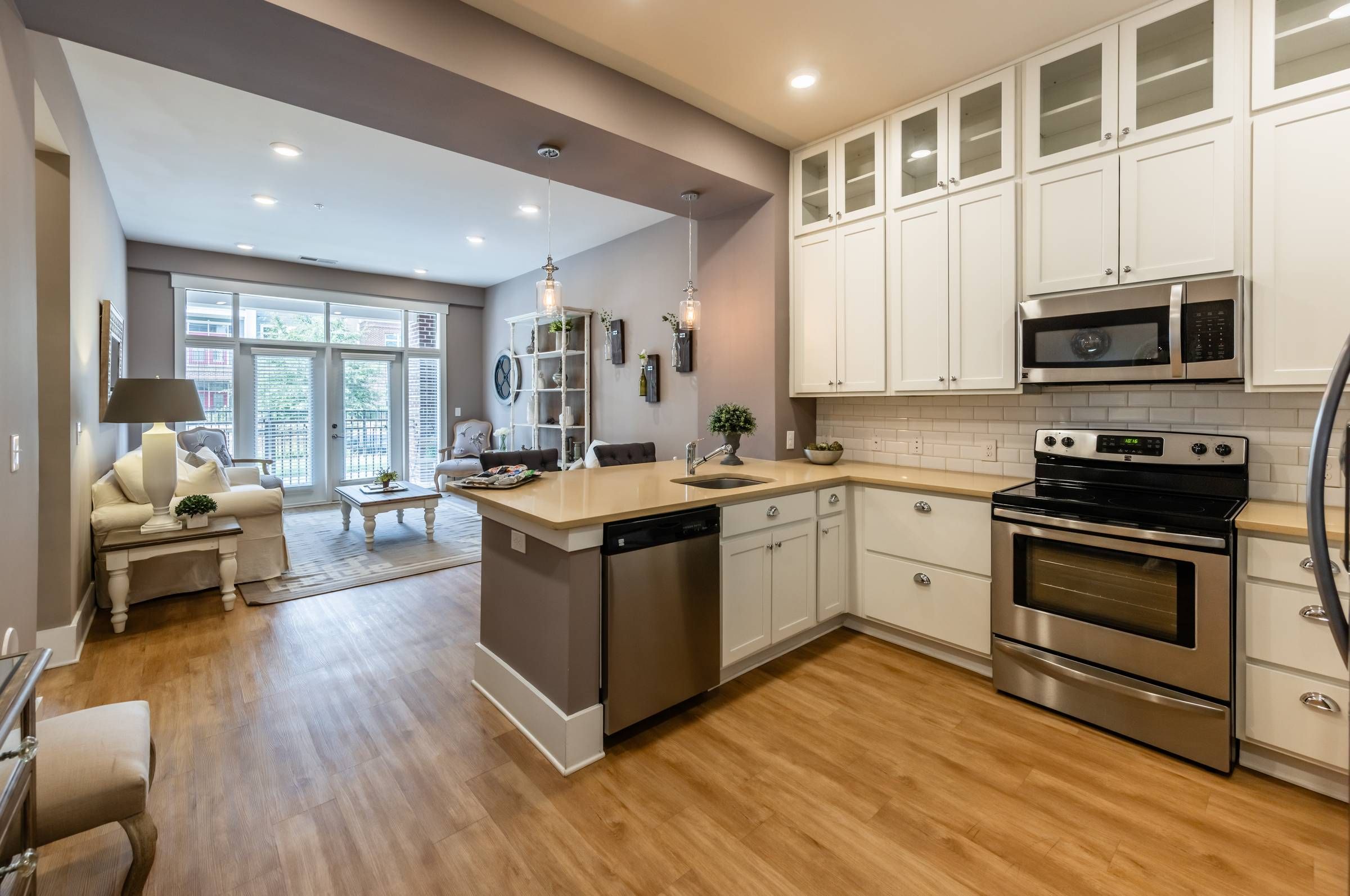Apartments at holly crest luxury apartment interior with hardwood floors and modern furnishings