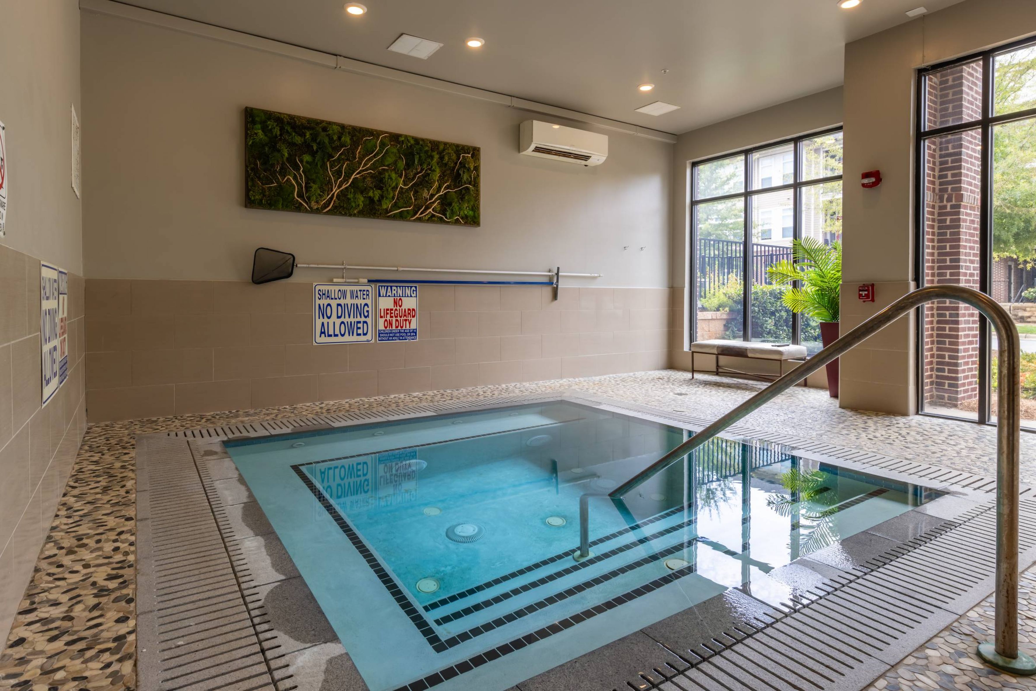 Apartments at Holly Crest luxury indoor hot tub amenity