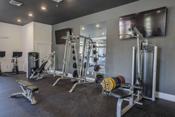 Apartments at holly crest  resident gym with weight equipment