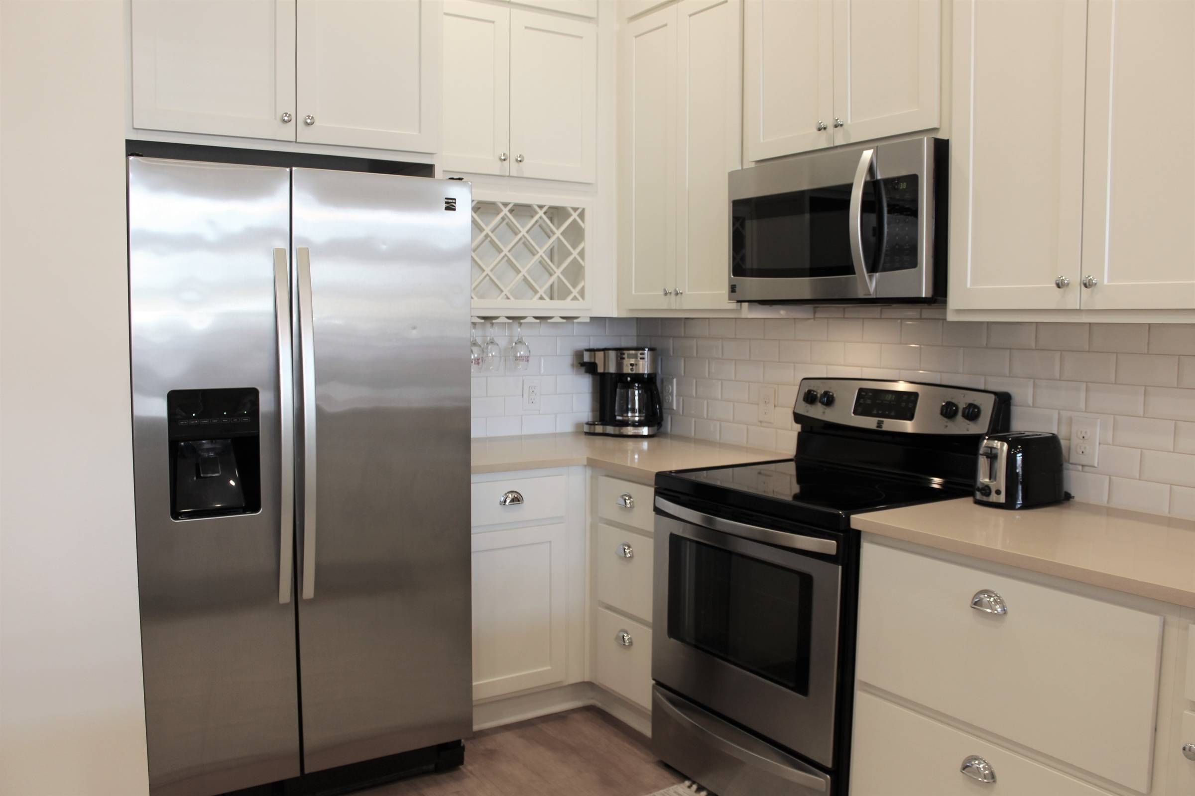 Apartments at holly crest gust suite kitchen with stainless steel appliances
