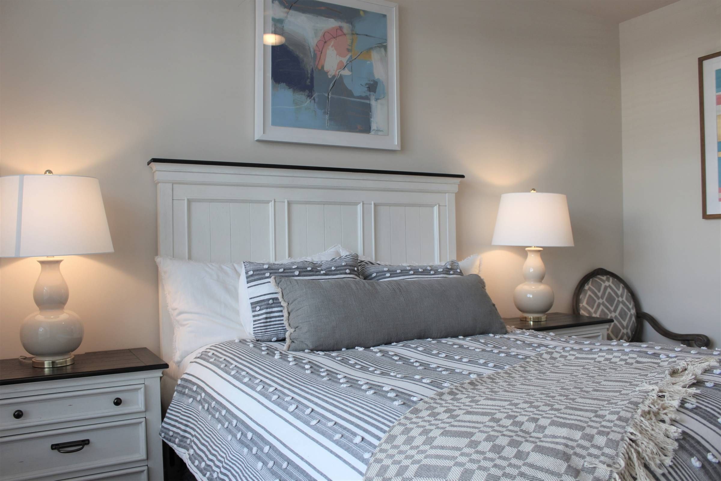 Apartments at holly crest guest suite bedroom with queen size bed and modern furnishings