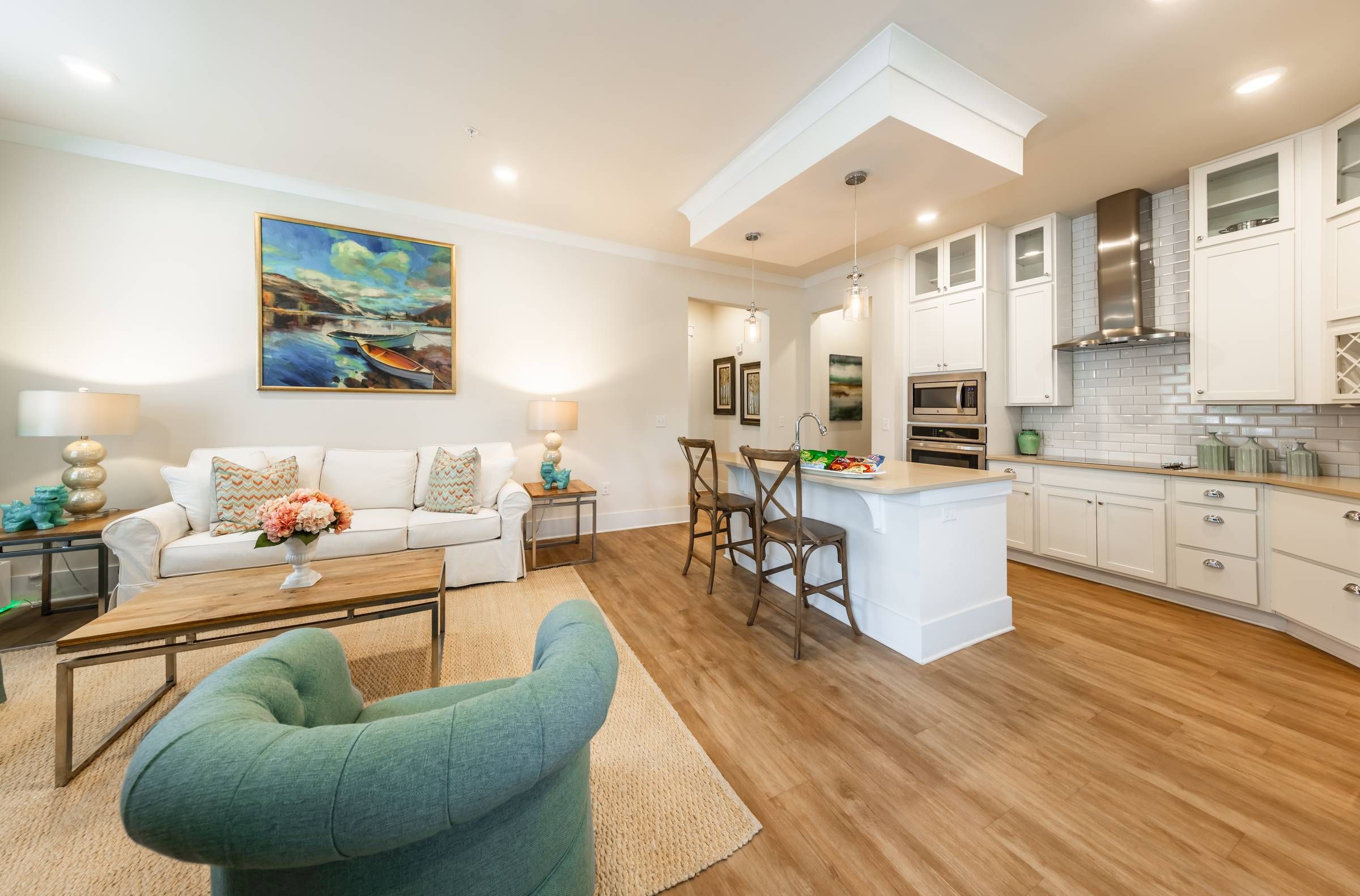 Apartments at holly crest luxury apartment open concept floor plan with kitchen island and hardwood floor